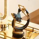 Escultura Elegância em Movimento: A Graça da Bailarina